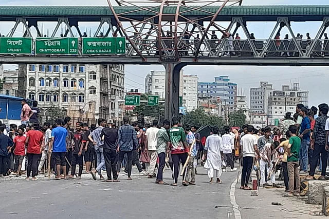 Protesting students blocked Dhaka-Chattogram highway at Shanir Akhra in the capital on Wednesday, demanding quota reform in government jobs.